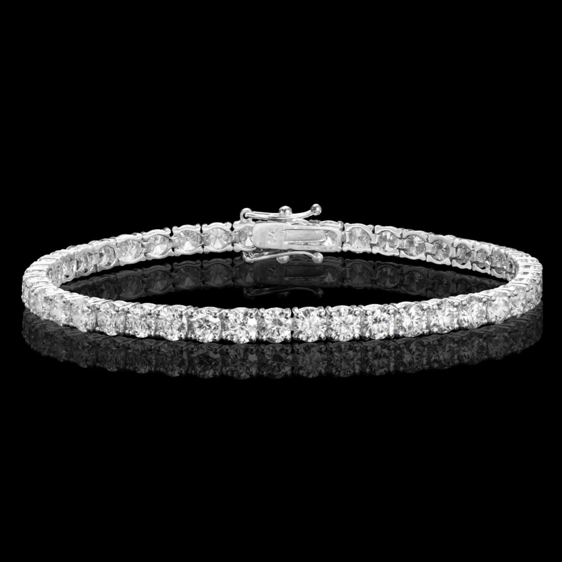 18k White Gold 10.68ct Diamond Bracelet: Retail: $38,185.00 ****** 18k White Gold 10.68ct Diamond Bracelet ****** Metal: 18K White Gold / Total Item Weight: 13.6 grams / Country Made: United States / / Main Stone: Diamond / Carat Total Weigh