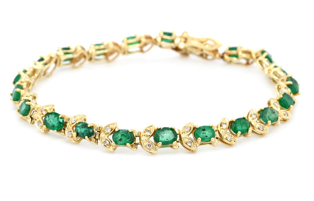 14K Yellow Gold Ladies Bracelet with 5.15tcw Emeralds and 0.38tcw Diamonds: Retail: $6,000.00 ****** 14K Yellow Gold Ladies Bracelet with 5.15tcw Emeralds and 0.38tcw Diamonds ****** Size: 7 / Metal: 14K Yellow Gold / Total Item Weight: 10.4 Grams / Country Made: United State