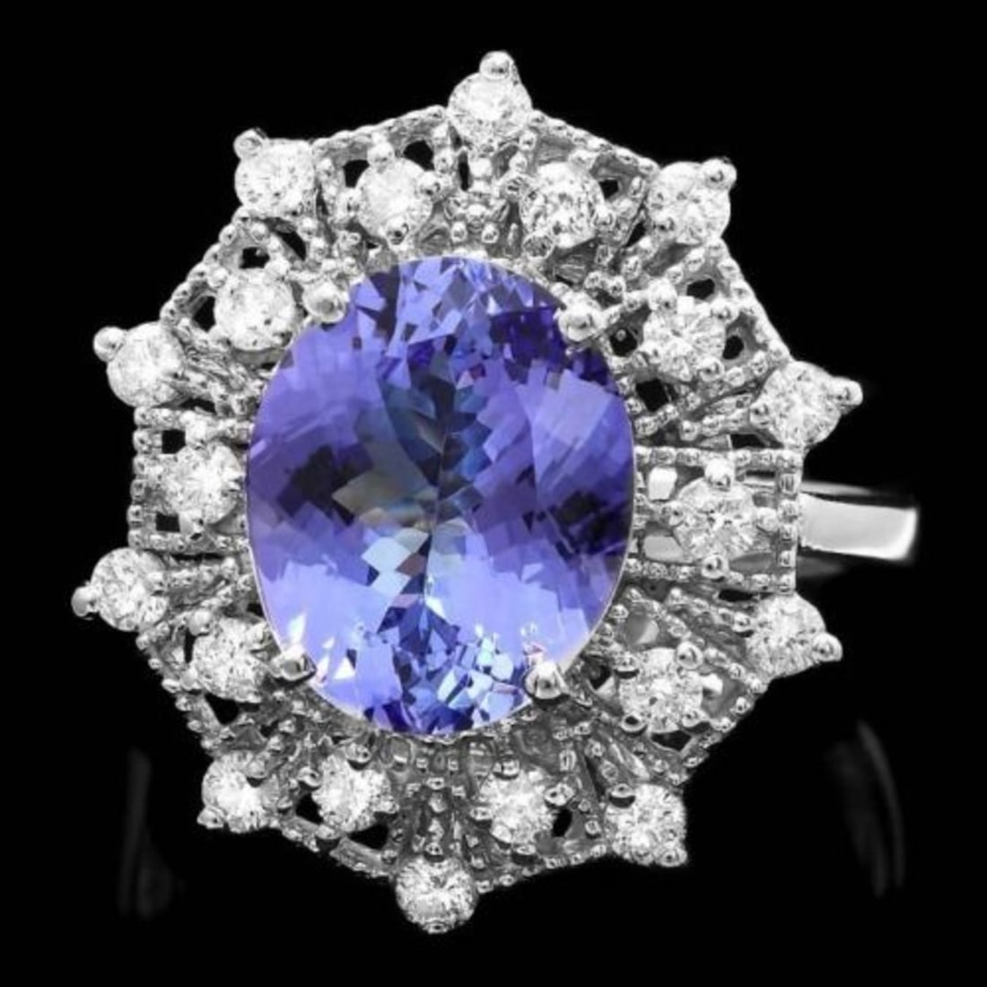 14K White Gold 4.08ct Tanzanite and 0.66ct Diamond Ring: Retail: $9,368.00 ****** 14K White Gold 4.08ct Tanzanite and 0.66ct Diamond Ring ****** Metal: 14K White Gold / Total Item Weight: 6.3 Grams / Country Made: United States / / Main Stone: Tanzanite / C