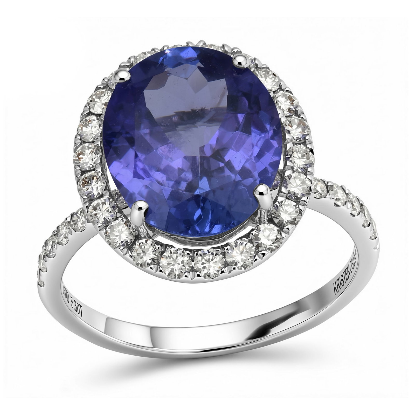 14K White Gold Ladies Ring with 5.30ct Tanzanite and 0.64tcw Adjacent Diamonds: Retail: $17,290.00 ****** 14K White Gold Ladies Ring with 5.30ct Tanzanite and 0.64tcw Adjacent Diamonds ****** Size: 7 / Metal: 14K White Gold / Total Item Weight: 3.5 Grams / Country Made: United St