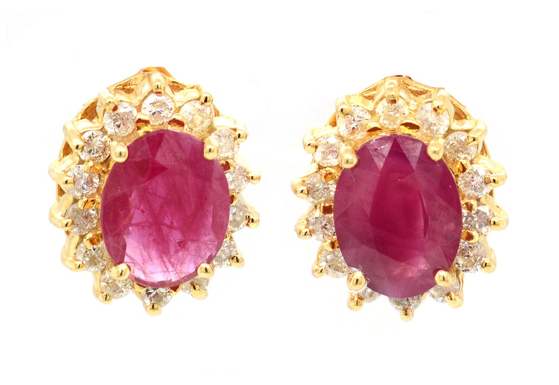 14K Yellow Gold Ladies Earrings with 3.22tcw Rubies and 0.35tcw Diamonds: Retail: $4,500.00 ****** 14K Yellow Gold Ladies Earrings with 3.22tcw Rubies and 0.35tcw Diamonds ****** Metal: 14K Yellow Gold / Total Item Weight: 5.4 Grams / Country Made: United States / / Main