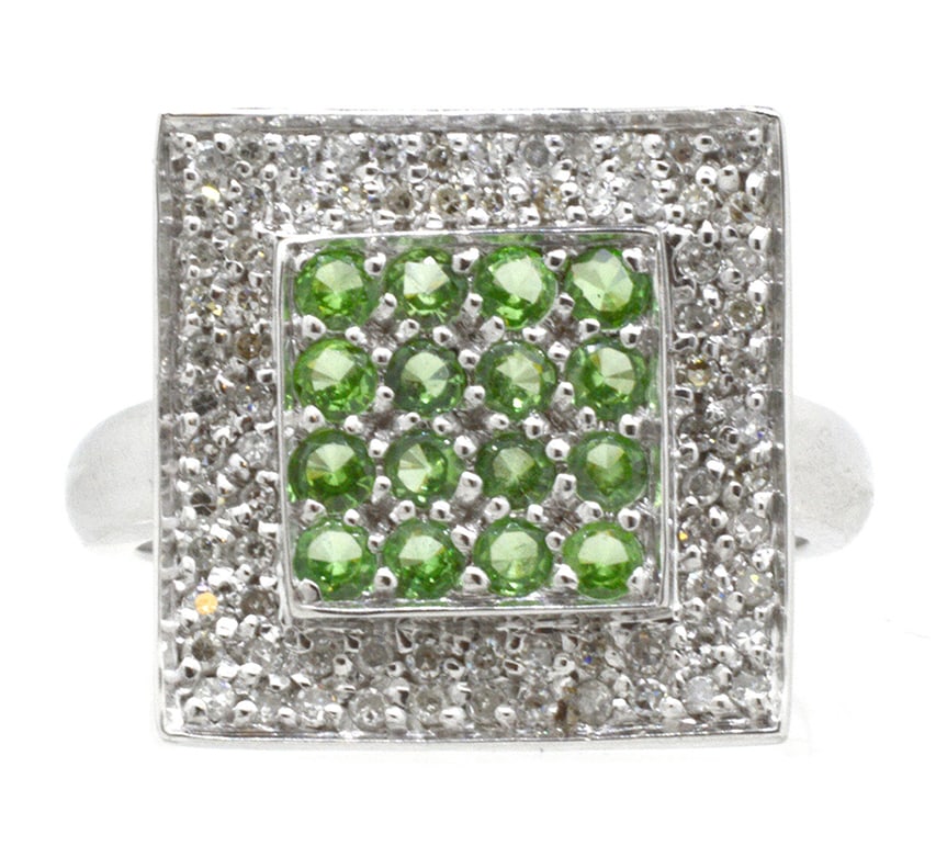 14K White Gold Ladies Ring with 0.57ct Tsavorites and 0.33ct tw Adjacent Diamonds: Retail: $1,200.00 ****** 14K White Gold Ladies Ring with 0.57ct Tsavorites and 0.33ct tw Adjacent Diamonds ****** Size: 6.5 / Metal: 14K White Gold / Total Item Weight: 4.4 Grams / Country Made: Unite