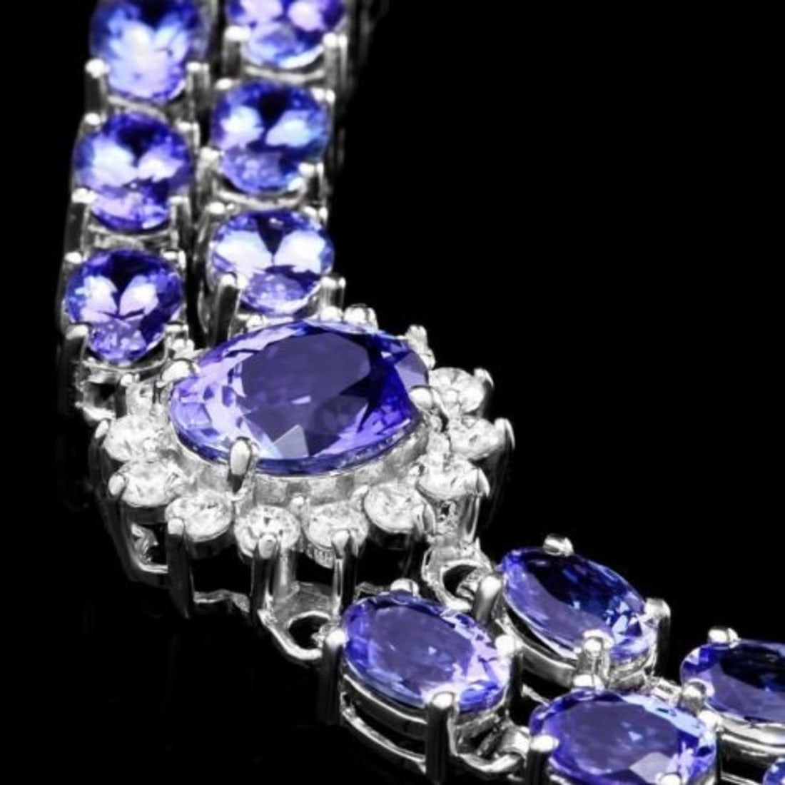 14k 21.63ct Tanzanite 1.69ct Diamond Bracelet: Retail: $18,500.00 ****** 14k 21.63ct Tanzanite 1.69ct Diamond Bracelet ****** Size: 7 / Metal: 14k Solid White Gold / Total Item Weight: 20.9 grams / Country Made: United States / / Main Stone: Tanza