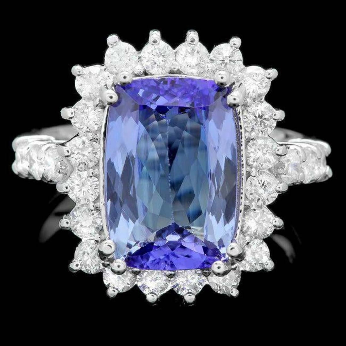 14K White Gold 4.10ct Tanzanite and 1.04ct Diamond Ring: Retail: $9,746.00 ****** 14K White Gold 4.10ct Tanzanite and 1.04ct Diamond Ring ****** Metal: 14K White Gold / Total Item Weight: 6.5 Grams / Country Made: United States / / Main Stone: Tanzanite / C