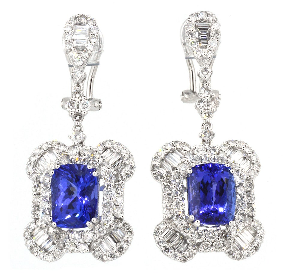 18K White Gold Ladies Earrings with 5.75ct Tanzanite and 3.39ct tw Adjacent Diamonds: Retail: $17,500.00 ****** 18K White Gold Ladies Earrings with 5.75ct Tanzanite and 3.39ct tw Adjacent Diamonds ****** Size: 1.5 long / Metal: 18K White Gold / Total Item Weight: 10.5 Grams / Country M