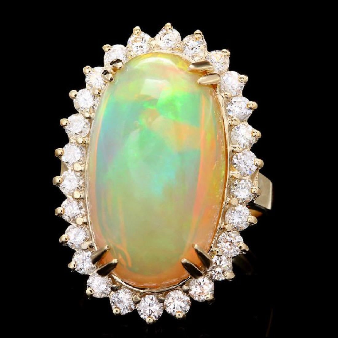 14K Yellow Gold 13.62ct Opal and 1.17ct Diamond Ring: Retail: $21,365.00 ****** 14K Yellow Gold 13.62ct Opal and 1.17ct Diamond Ring ****** Metal: 14K Yellow Gold / Total Item Weight: 10.5 Grams / Country Made: United States / / Main Stone: Opal / Color: