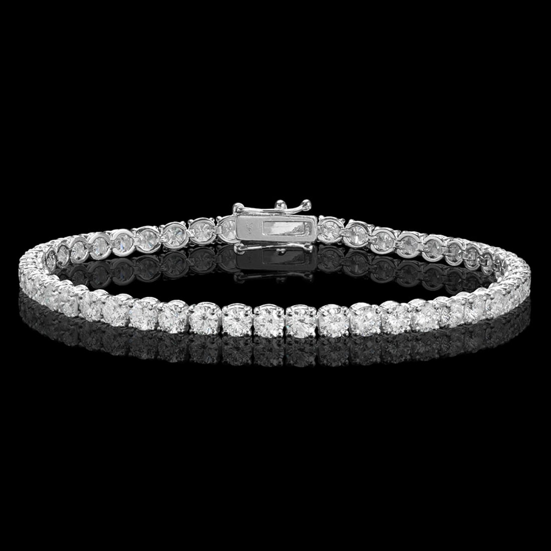 18k White Gold 8.61ct Diamond Bracelet: Retail: $31,100.00 ****** 18k White Gold 8.61ct Diamond Bracelet ****** Metal: 18K White Gold / Total Item Weight: 11.2 grams / Country Made: United States / / Main Stone: Diamond / Carat Total