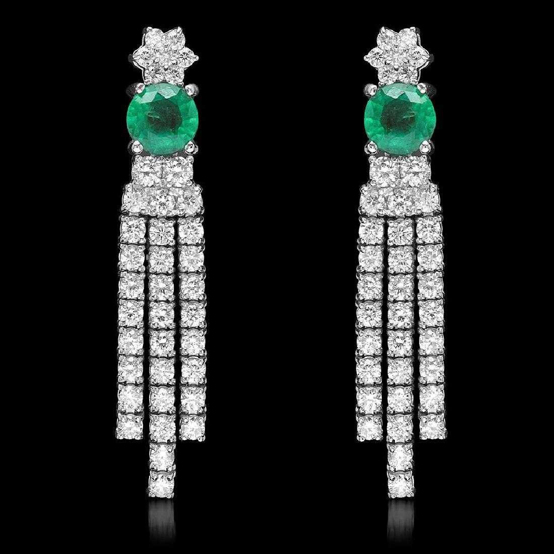 18K White Gold 1.66ct Emerald and 2.57ct Diamond Earrings: Retail: $14,175.00 ****** 18K White Gold 1.66ct Emerald and 2.57ct Diamond Earrings ****** Metal: 18K White Gold / Total Item Weight: 7.6 Grams / Country Made: United States / / Main Stone: Emerald / 