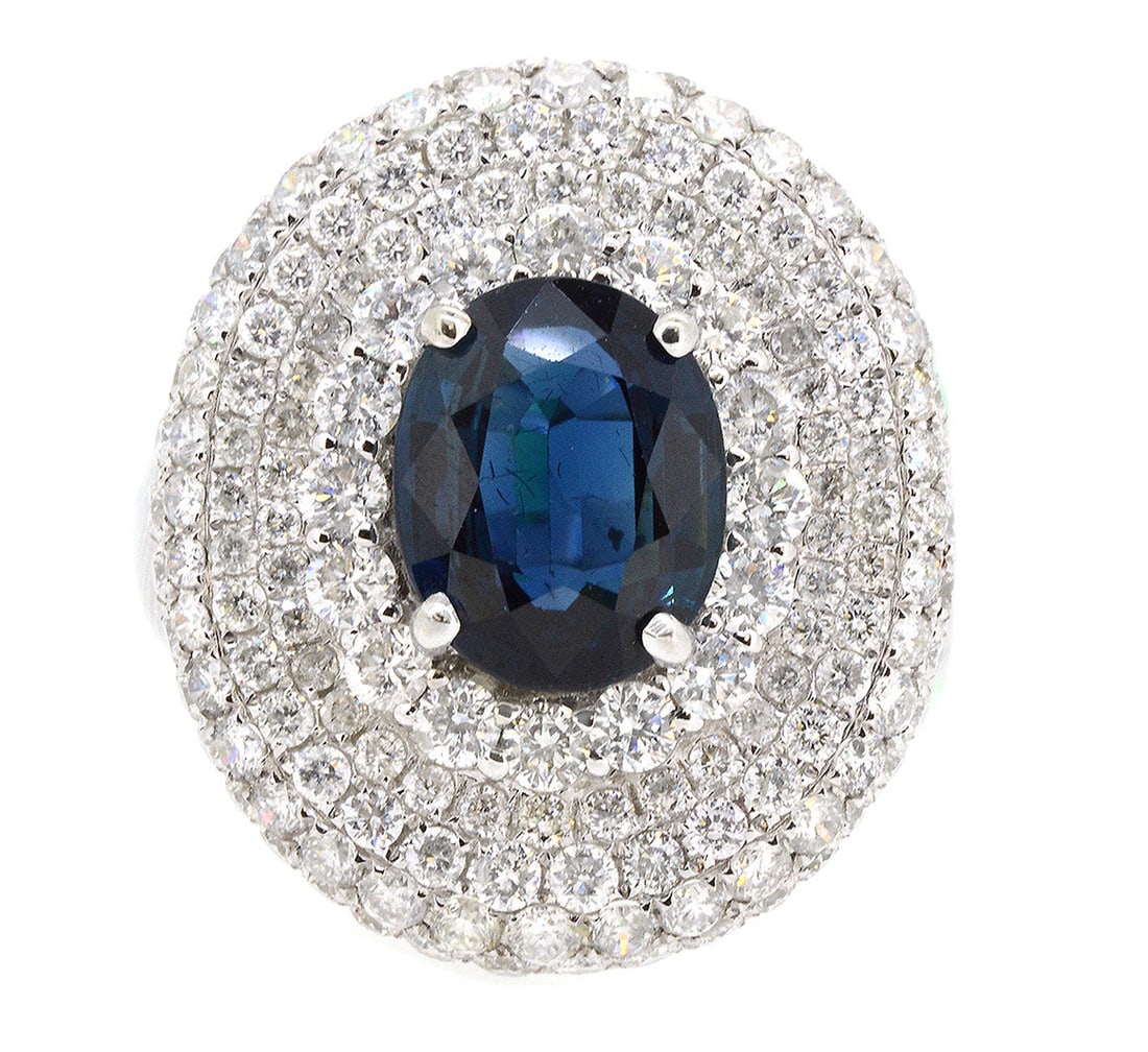 18K White Gold Ladies Ring with 3.22ct Sapphire and 2.64ct tw Adjacent Diamonds: Retail: $14,300.00 ****** 18K White Gold Ladies Ring with 3.22ct Sapphire and 2.64ct tw Adjacent Diamonds ****** Size: 6.5 / Metal: 18K White Gold / Total Item Weight: 9.03 Grams / Country Made: