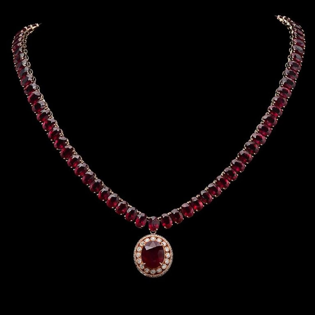 14K Gold 115.49ct Ruby 1.38ct Diamond Necklace: Retail: $42,988.00 ****** 14K Gold 115.49ct Ruby 1.38ct Diamond Necklace ****** Metal: 14K Rose Gold / Total Item Weight: 52.3 Grams / Country Made: United States / / Main Stone: Ruby / Color: Red /