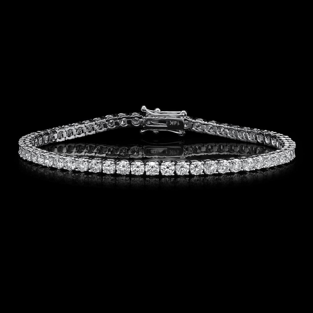 14K White Gold and 5.92ct Diamond Bracelet: Retail: $22,896.00 ****** 14K White Gold and 5.92ct Diamond Bracelet ****** Metal: 14K White Gold / Total Item Weight: 9.4 Grams / Country Made: United States / / Main Stone: Diamond / Carat Total