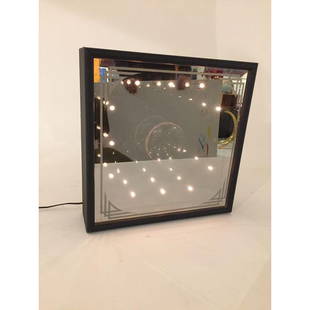 Mid-Century Infinity Light Mirror: A Mid-Century vintage mirror light in a wood frame box. It has been tested and is working. Great pop up for any eclectic space!Dimensions: W11.5" x D3.0" x H11.5" inches. lessDetailsCondition: