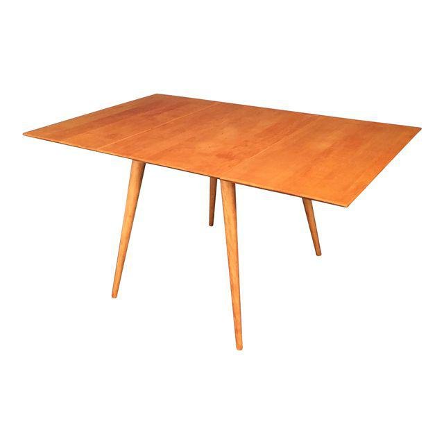 Paul McCobb Planner Group Dining Table: Stunning Mid-Century vintage McCobb Planner Group dining table has been refinished and is in beautiful condition. It's as good as new with no blemishes on the table top or the legs. Structurally it is