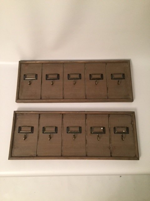 Modern wall key hanging pair: two key wall panel hanging keys each have 5 hooks made from wood. good condition.