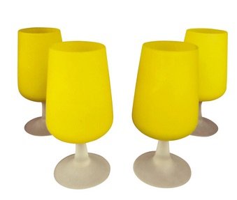 MidCentury Modern Italian Handblown Yellow Wine Glasses: Mid-century yellow Italian hand blown wine glasses set of 4 thin glass high-end glass.Great for your next party. Dimensions: 2.5ʺW × 3ʺD × 7ʺHPeriod: 1960sStyles: Italian Mid-Century 