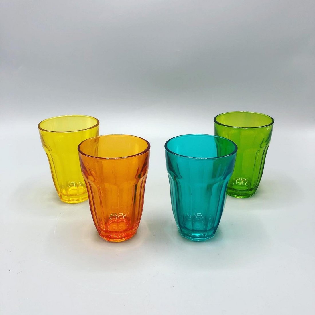 Mid century multicolored stem glass set of 4: Mid century multicolored stem glass set of 4Dimensions: Base diameter 2” inches Height: 4” inches Top opening: 3” inches