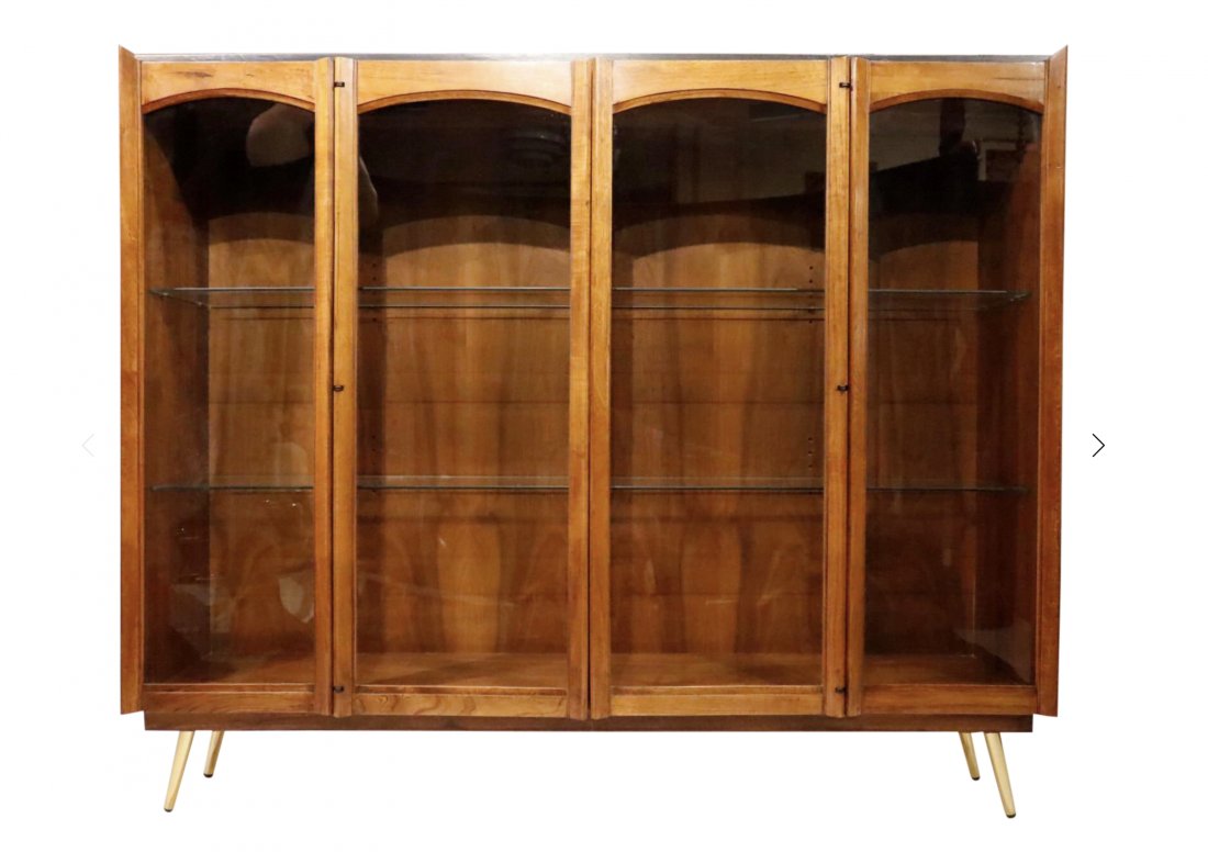 1960s Mid-Century Walnut China Cabinet: Mid-Century Walnut China cabinet buffet with glass doors and 2 glass shelves. Inner electric lights and brass legs. The 1960s circadimensions: W59 x D14 x H49 inches