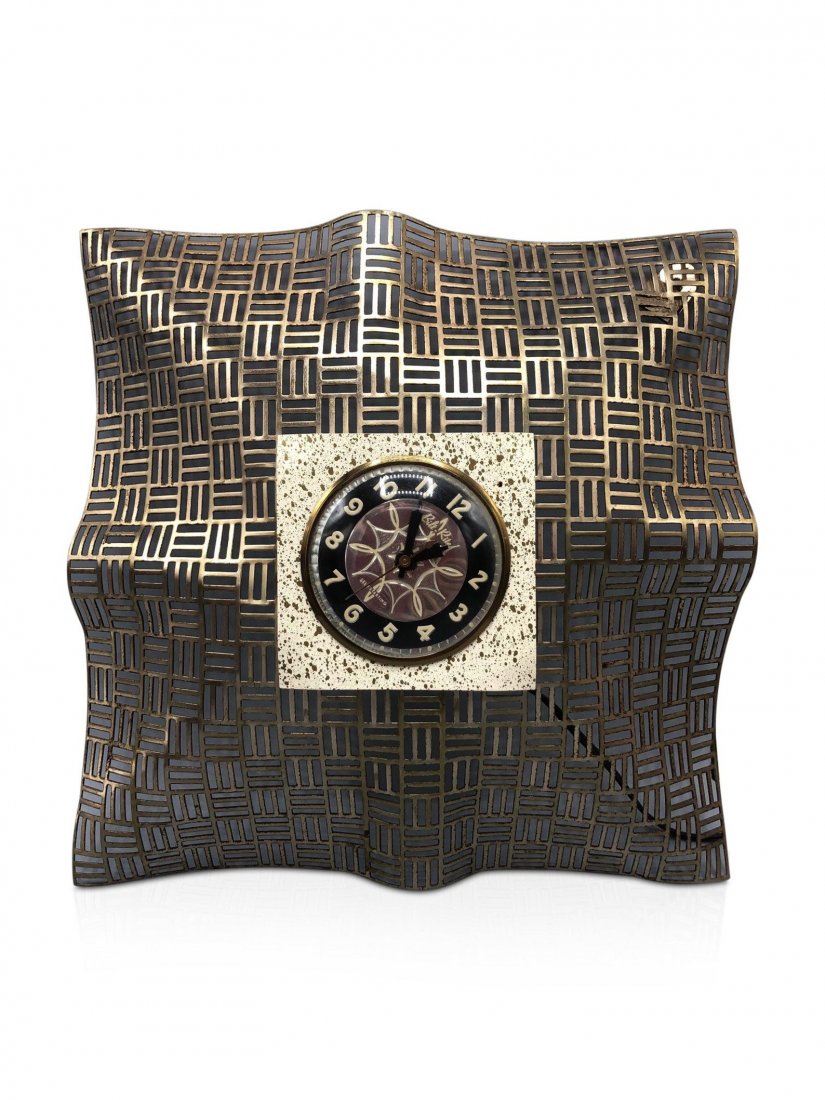 Mid-century brass electric wall clock 1960Â’s: Vintage from the 1960s Materials: brass Description: Mid-century brass electric wall clock 1960Â’s Dimensions: 12in. x 12in. 2in. deep. Tested and working.