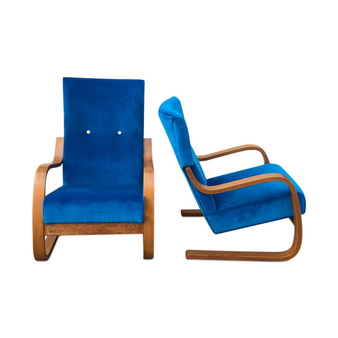 Mid-Century Pair curated vintage chairs by the acclaimed Finnish designer and architect Alvar Aalto. (1 of 4)