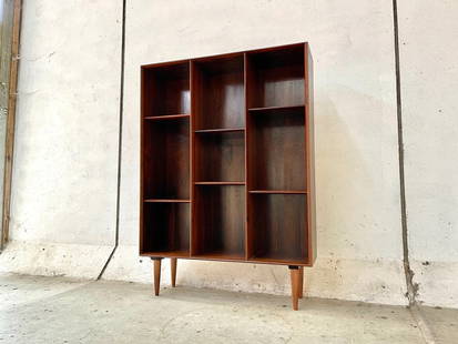 Mid-Century rosewood bookcase: Mid-Century rosewood bookcase---Dimensions:--Width--40 in .--Depth------12in-------Height--55--in.