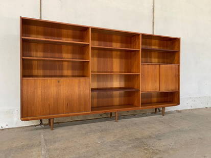 Mid-Century Large teak bookcase: Mid-Century Large teak bookcase 8' feet long approximately W95 inches x D10 inches x H52 inches.