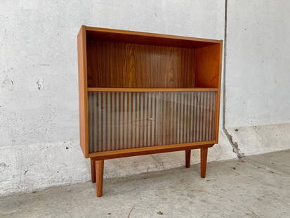 Teak bookcase with sliding glass doors on sharpened teak legs: Teak bookcase with sliding glass doors on sharpened teak legs