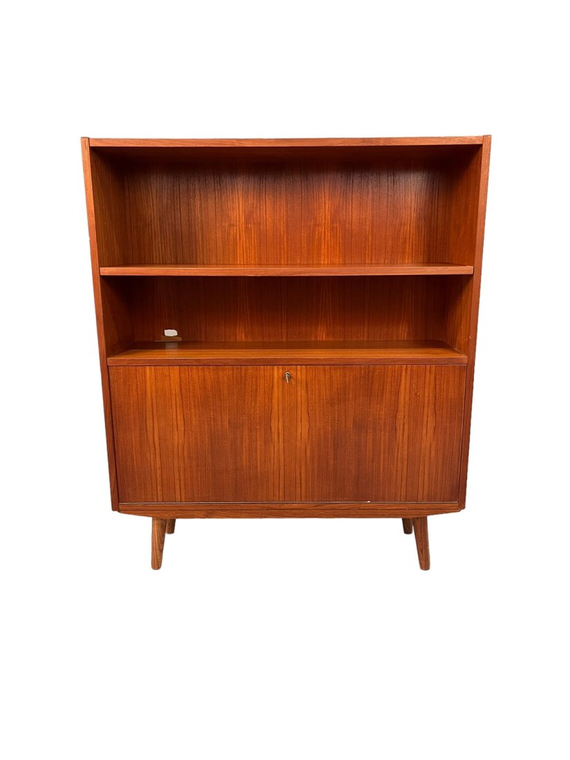 Mid-Century Bookcase with Storage in the bottom: Dimensions W39 1/2 x D11 1/2 x H47 inchesMid Century teak danish bouquets with Storage in the bottom 1960s Circa the shelf are adjustable and removable.