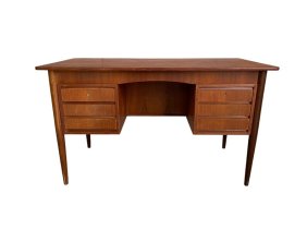 Mid-Century Teak desk with 6 drawers and library.