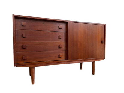 Mid-Century Teak sideboard with 4 drawers and cupboard space behind sliding door: Dimensions: W:47 D:16 H:30 inches Mid-Century Teak sideboard with 4 drawers and cupboard space behind sliding door