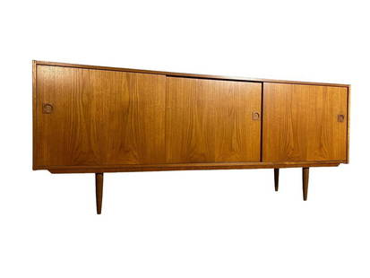 Mid-Century Danish Low teak sideboard with 4 drawers and plenty of cupboard space: Dimensions: W:79 D:17 H:31 inches Mid-Century Danish Low teak sideboard with 4 drawers and plenty of cupboard space