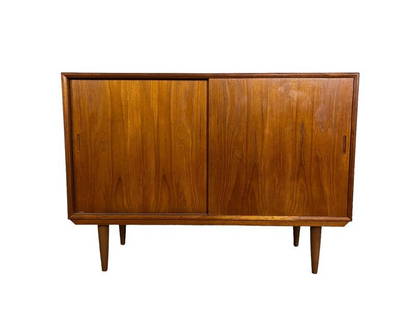 Mid-Century Danish Teak Sideboard with sliding doors: Dimensions: W:44 D:15 H:31 inches Mid-Century Danish Teak Sideboard with sliding doors