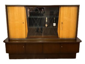 Introduce a touch of mid-century sophistication to your dining area with this stunning high glass Ch