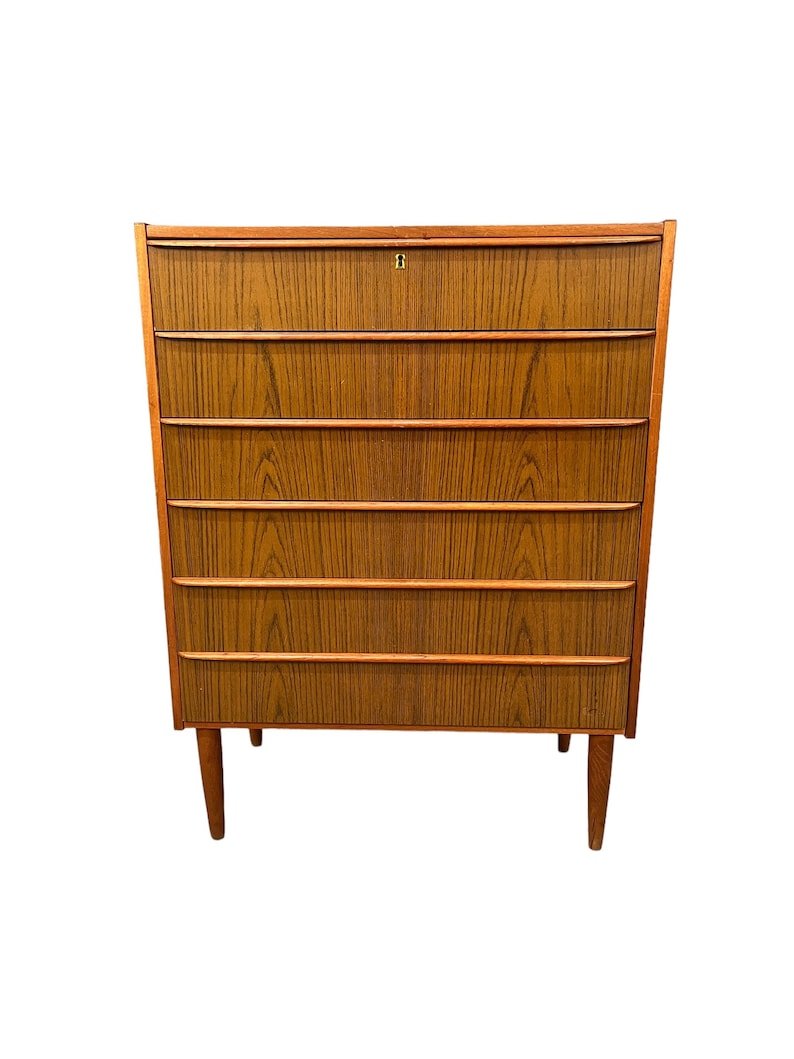 Mid-Century Teak Chest of Drawers 1960's: Dimensions:W 30 x D 16 x H41 inches. Mid-Century Teak Chest of Drawers 1960's