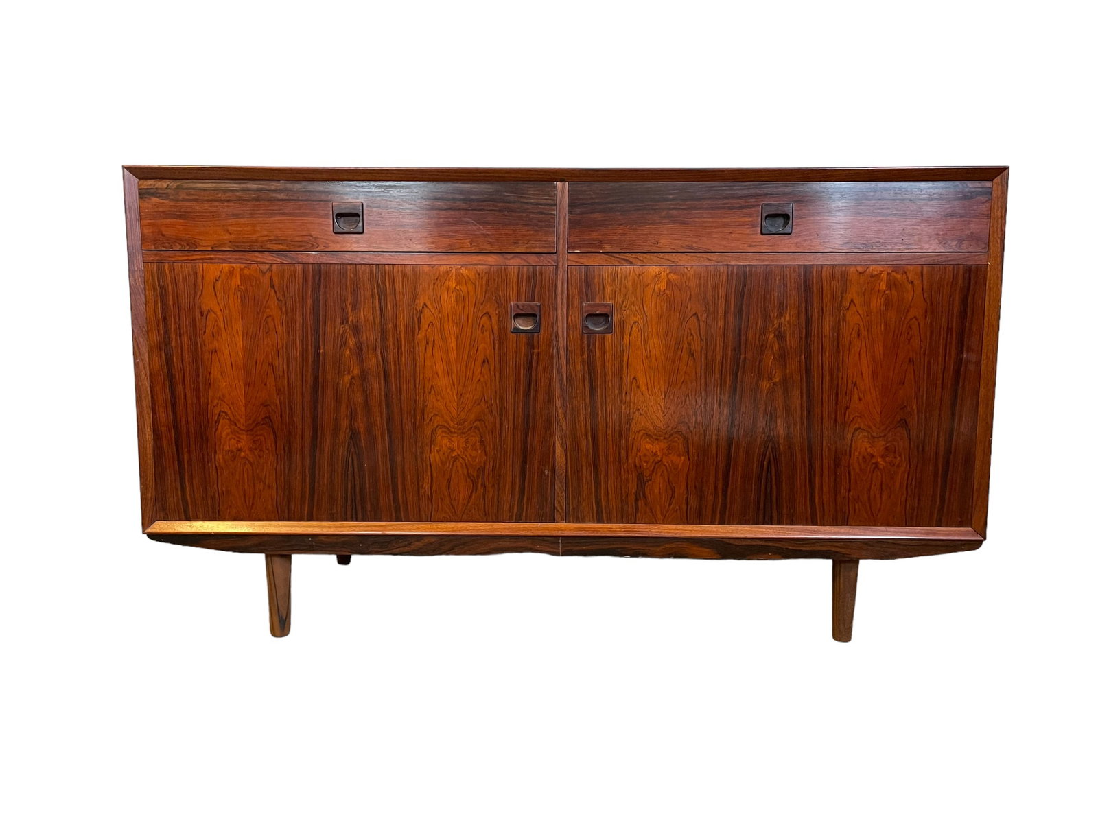 Mid-Century Modern Rosewood sideboard from Brouer 1960's: Dimensions: W53 x D20 x H30 inches. Mid-Century Modern Rosewood sideboard from Brouer 1960's. 2 drawers with an open doors on the bottom (shelves can be removed or adjust. Very good condition consider