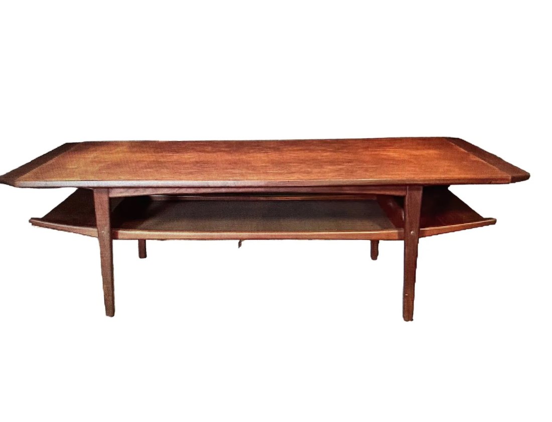 Mid-Century Teak coffee table with magazine shelf: Dimensions: W62 x W22.5 x H21 inchesMid-Century Teak coffee table with magazine shelf.