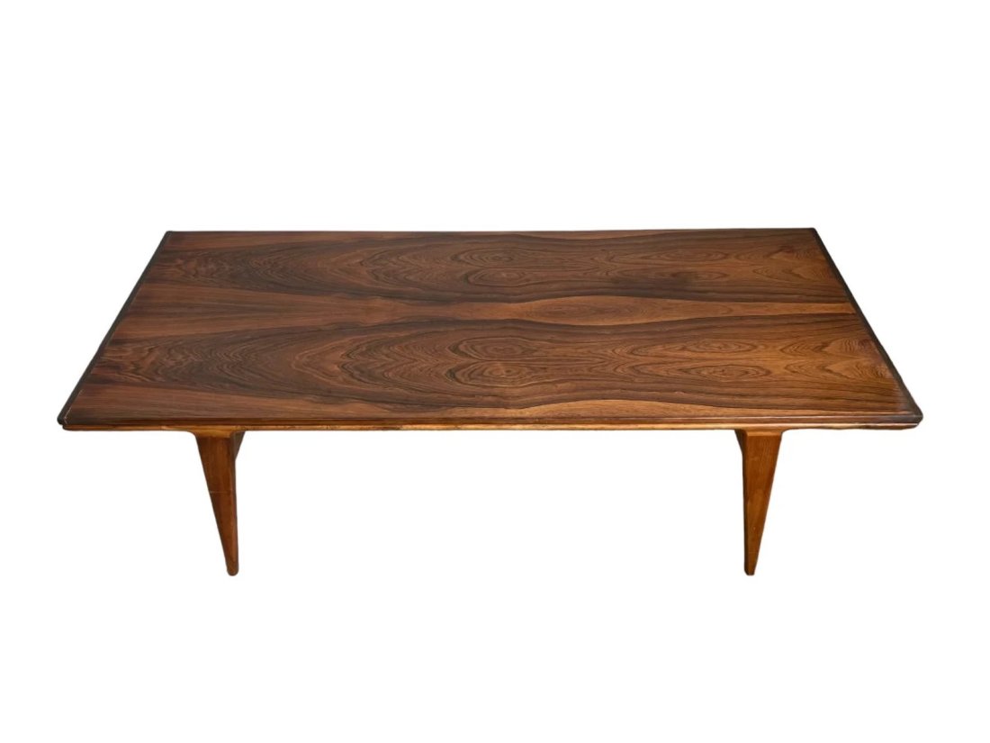 Mid-Century Coffee table in rosewood from Illum Wikkelsø. Stamped with “danish furniture: Dimensions: W 59" x D 24" x H 20 inches Extension Fully opened 78"Mid-Century Coffee table in rosewood from Illum Wikkelsø. Stamped with “danish furniture maker”