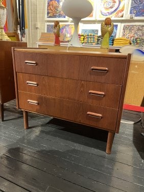 Mid-Century teak dresser with 3 drawers: Dimensions: W34 x D19 X H28.5 Inches. Mid-Century Modern Teak with 3 drawers solid teak heavy & sturdy 1960's circa