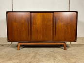 Mid century Teak sideboard with sliding doors