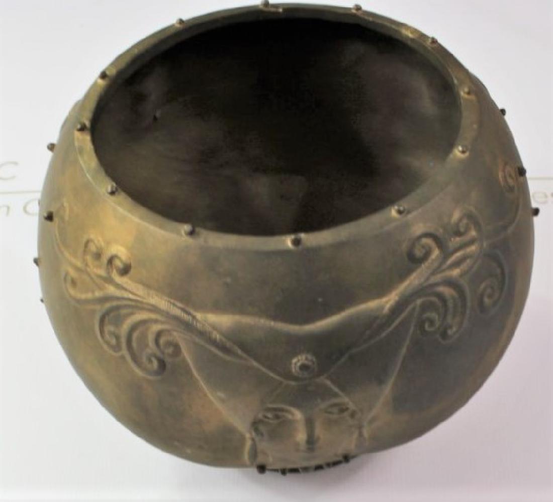 Erte Pottery: Erte Romain de Tirtoff. Medium: Bronze. Title: Fruit of Life, 1985. Signature: Stamped towards bottom of base. From the edition of 275. Dimensions: 10 x 8.5 inches.