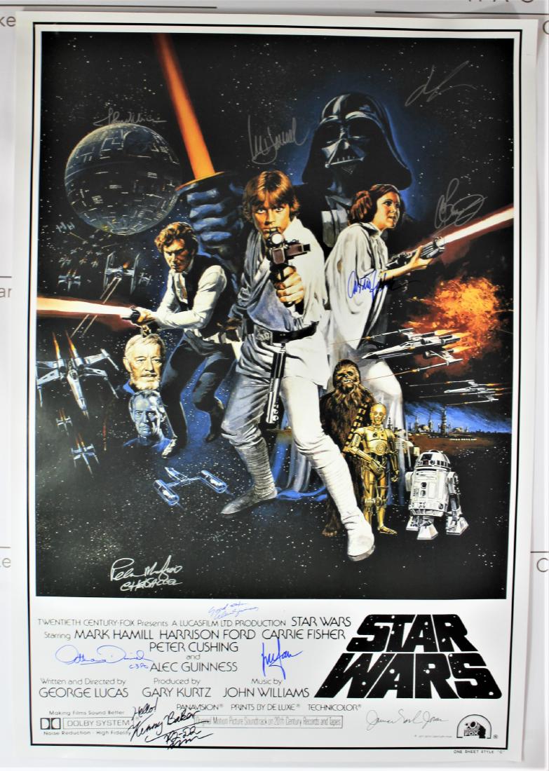 Star Wars Movie Signed Poster: Star Wars poster signed by Harrison Ford, Mark Hamill, Carrie Fisher, Jack Purvis, George Lucas, John Williams, Kenny Baker, Peter Mayhew, James Earl Jones and Alec Guinness