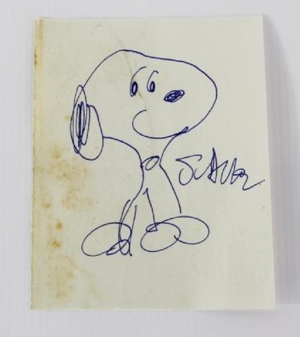 Charles M Schulz (American, 1922-2000): Medium: Marker on paper. Title: Snoopy. Signature: Lower right side. Dimensions: 6 x 4 inches.