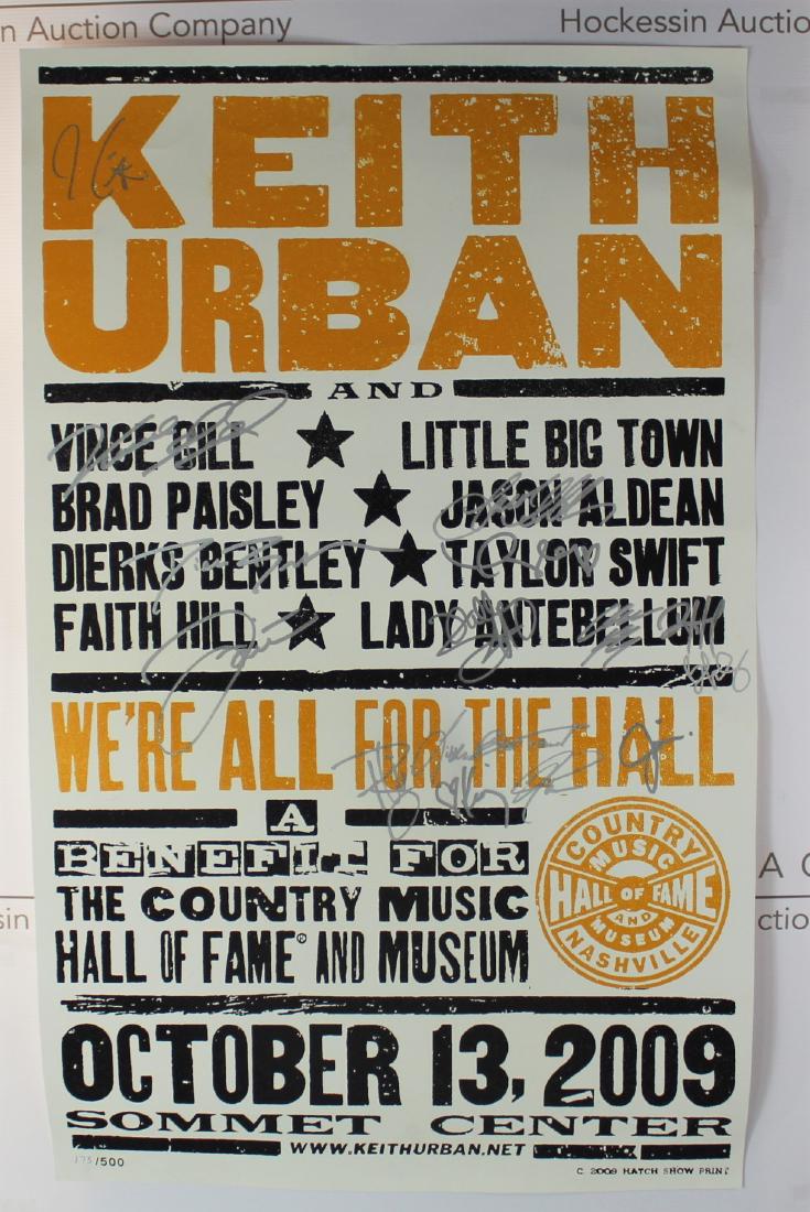 Country Singers Signed Poster: Poster autographed by many country stars. Signatures are: Keith Urban, Vince Gill, Taylor Swift, Jason Aldean, Brad Paisley, Dierks Bentley, Faith Hill, Lady Antebellum, and Little Big Town. Yellow wr