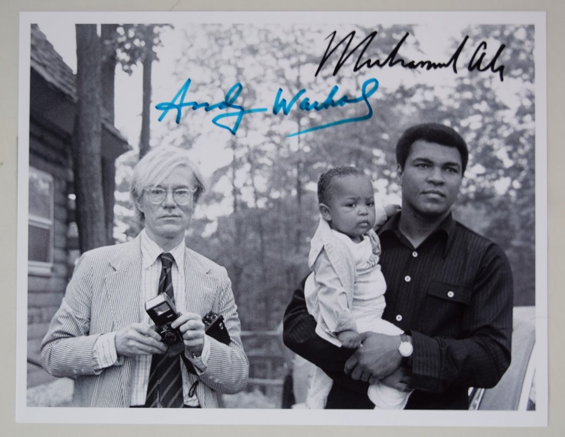 Photograph Signed by Andy Warhol & Boxer Muhammad Ali: Photograph of artist Andy Warhol & boxer Muhammad Ali. Each signed in marker. Dimensions: 8 x 10 inches.