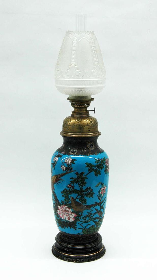 Cloisonne Oil Lamp by Theodore Deck: A 19th century Japanese cloisonneÌ enamel vase with an oil-burning lamp fittings. The body of the lamp is decorated with painted images of birds and foliage, and the tank, burner, and glass shade res