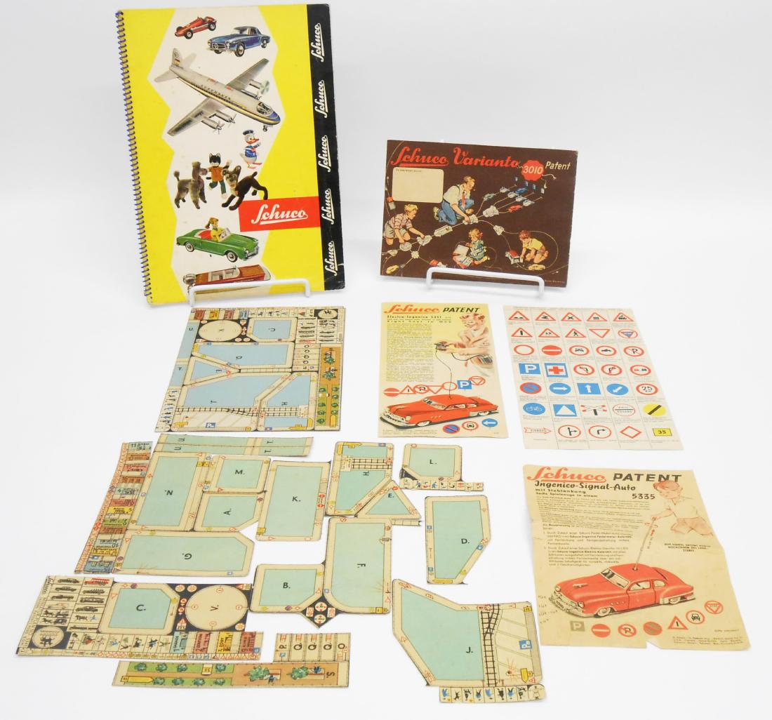 1960'S SCHUCO TOY CATALOG & EPHEMERA: Spiral bound; verbiage mostly in German; interior pages some in color, some in black & white; minor foxing; corners of cover have some minor creasing; 11 3/4" x 8 1/4", VG