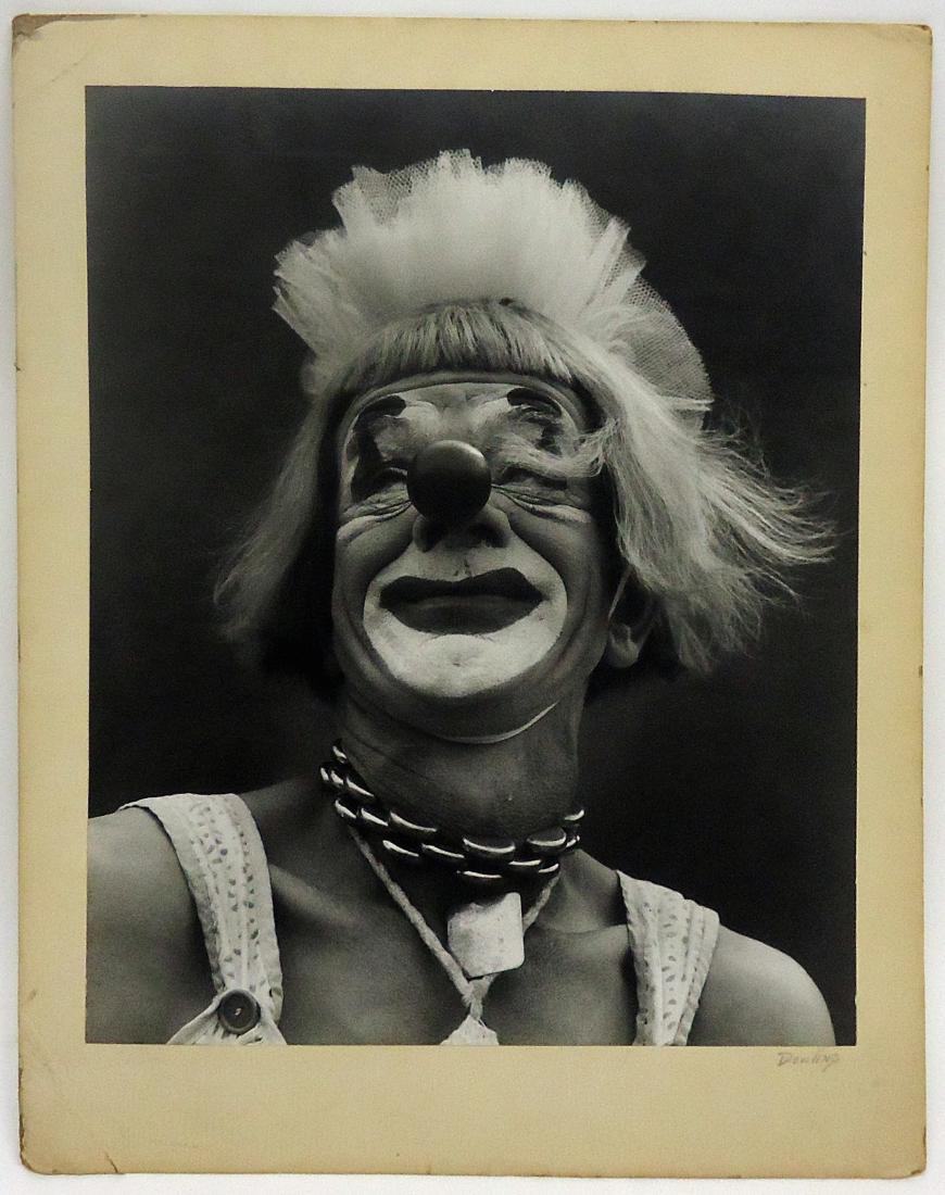 (2) CLOWN PHOTOS, BLACK & WHITE: Mounted on board; (1) stamped on back "Wilmington International Exhibition of Photography", title: Clown; Artist: Edward Dowling - Sharon Hill, PA; minor marks and slight scratches; 13 1/2" x 16 1/2" 