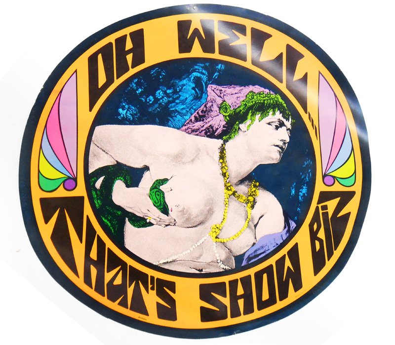 (2) LATE 1960'S/70'S WALL DECORATIONS: Round; colorful, disturbing imagery; (1) "Oh Well That's Show Biz"; (1) "Don't Knock It If You Haven't Tried It"; both marked "Printed in USA" and "Festoon"; pin-holes from hanging; light edge wear an