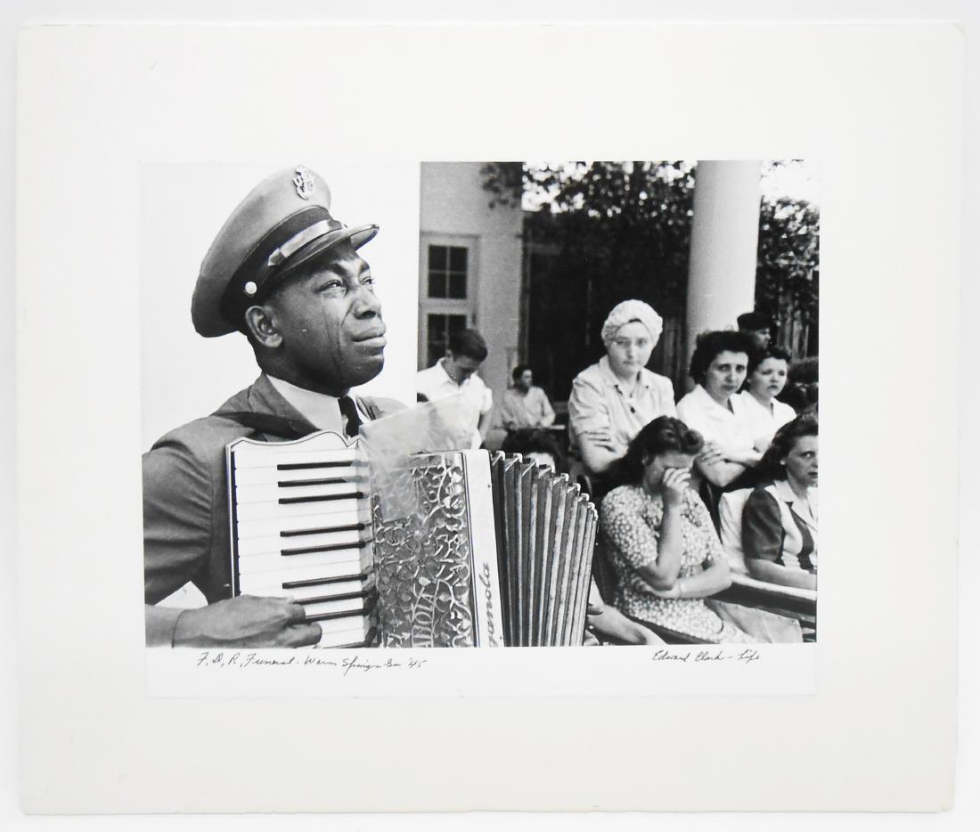 EDWARD CLARK PHOTOGRAPH - F.D.R. FUNERAL, WARM SPRINGS,: Iconic image featured in Life magazine, April 17, 1945; depicting the moving image of US Navy bandsman Graham W. Jackson Sr. playing "Goin' Home" on the accordion as the President Roosevelt's body was