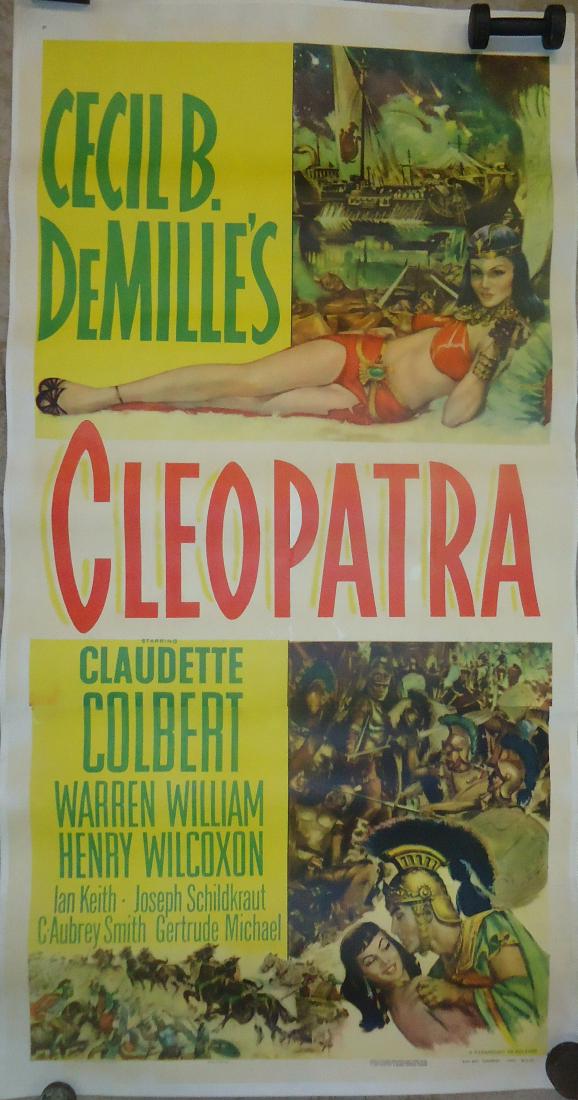 1952 MOVIE POSTER, PAPER LITHO - "CLEOPATRA": Canvas backed; Cecil B. Demille; starring Claudette Colbert and William Warren; printed in U.S.A.; Paramount re-release; creases minimalized when laid on canvas; canvas size: 81 1/4" x 42 1/2"