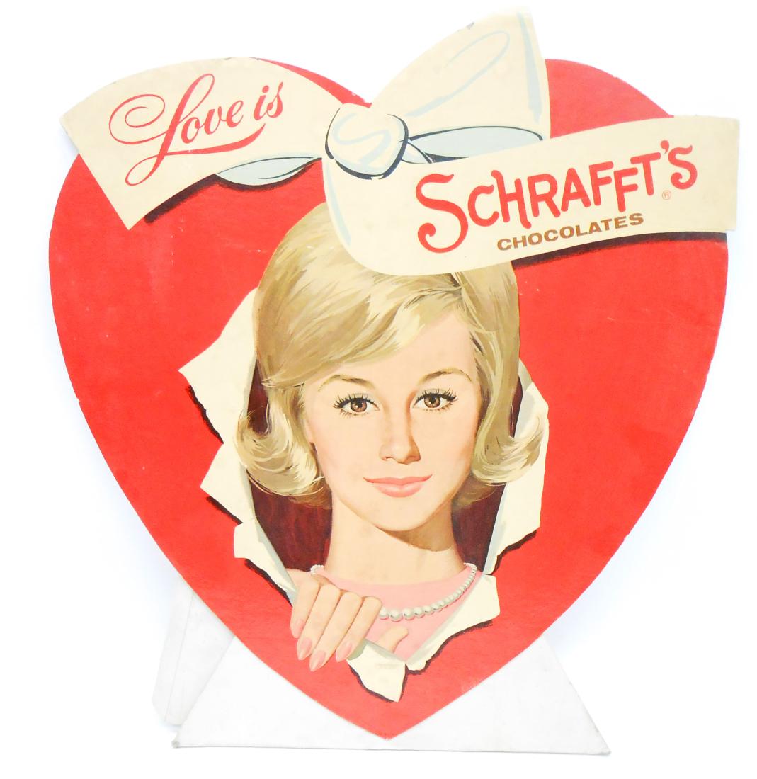 ADVERTISEMENT SCHRAFFT'S CHOCOLATES COUNTER-TOP DISPLAY: Cardboard litho die-cut; easel back; edge roughness and minor creasing; minor scratches, pin holes and blemishes; H-25", G-VG